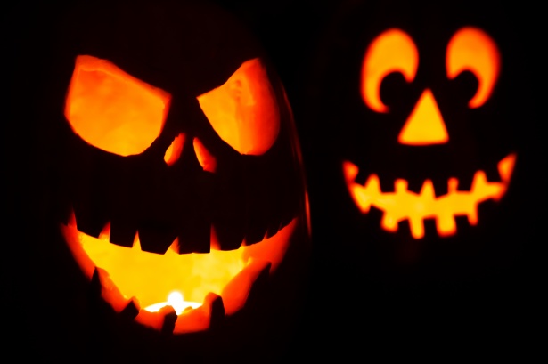 Carved pumpkin faces.