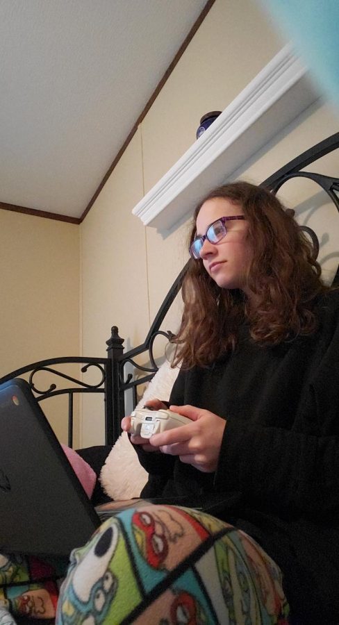 Senior Alexis Beckner realizes that video games are so much easier than a virtual class. 