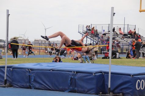 Blair Dowell participates in high jump. 